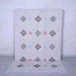 Moroccan man with authentic colorful kilim rug – 5.5 x 9.1 feet – handwoven Bohemian Berber carpet