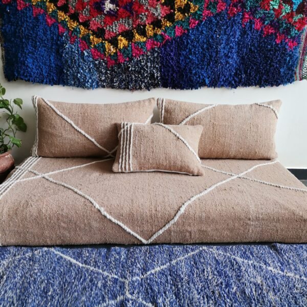 Video featuring beige Moroccan floor sofa – handcrafted low seating set with plain cushions for soft, calm, and cozy spaces