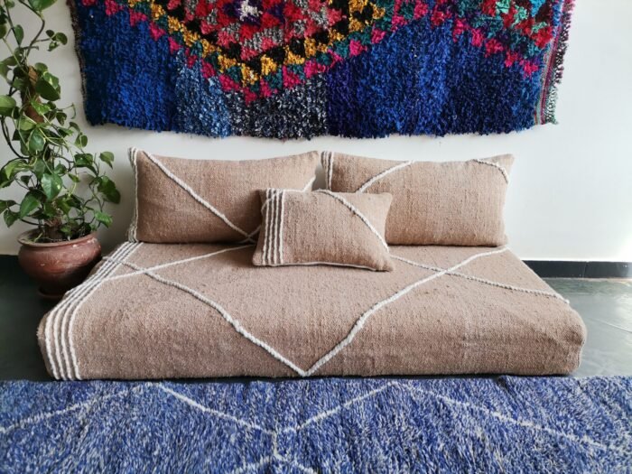 Video featuring beige Moroccan floor sofa – handcrafted low seating set with plain cushions for soft, calm, and cozy spaces