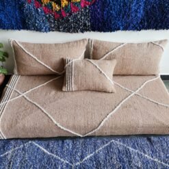 Video featuring beige Moroccan floor sofa – handcrafted low seating set with plain cushions for soft, calm, and cozy spaces
