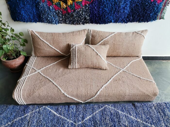 Video featuring beige Moroccan floor sofa – handcrafted low seating set with plain cushions for soft, calm, and cozy spaces