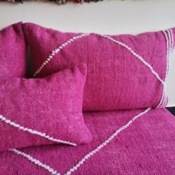 Close-up of pink plain cushions – handcrafted Moroccan pillows for elegant and soft boho living rooms