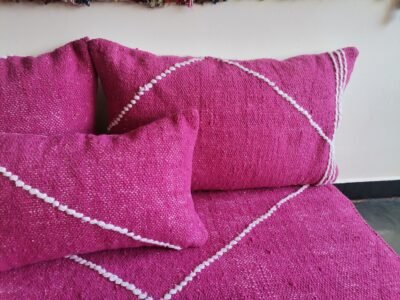Close-up of pink plain cushions – handcrafted Moroccan pillows for elegant and soft boho living rooms
