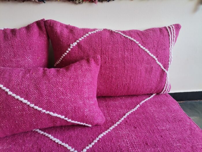 Close-up of pink plain cushions – handcrafted Moroccan pillows for elegant and soft boho living rooms