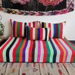 Main view of Moroccan wool sofa with multicolor striped design – handcrafted floor seating for vibrant boho-style interiors