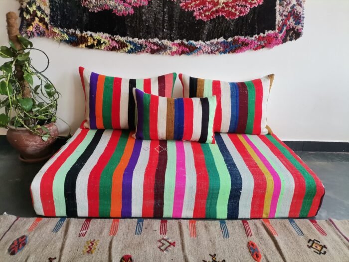 Main view of Moroccan wool sofa with multicolor striped design – handcrafted floor seating for vibrant boho-style interiors