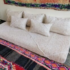 Top view of Moroccan floor sofa with cream and beige detailing – handwoven cover set for cozy and sophisticated spaces