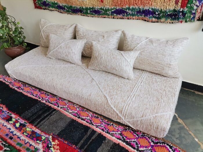 Top view of Moroccan floor sofa with cream and beige detailing – handwoven cover set for cozy and sophisticated spaces