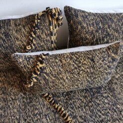 Top view of Moroccan floor sofa with black and mustard tones – artisan seating for strong, stylish interiors