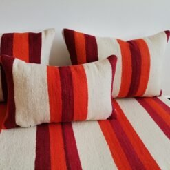 Cushions from Moroccan wool floor couch in cream with red and orange stripes – handcrafted pillow covers for modern bohemian and cozy living rooms