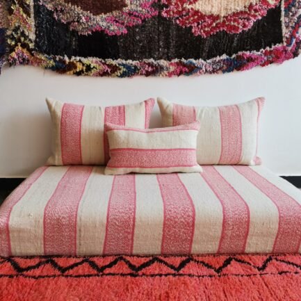 Moroccan handwoven wool floor sofa in cream with light pink blend – artisan seating with cushions for feminine cozy interiors