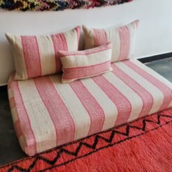 Moroccan wool couch in cream and light pink blend – handwoven low seating for modern interiors