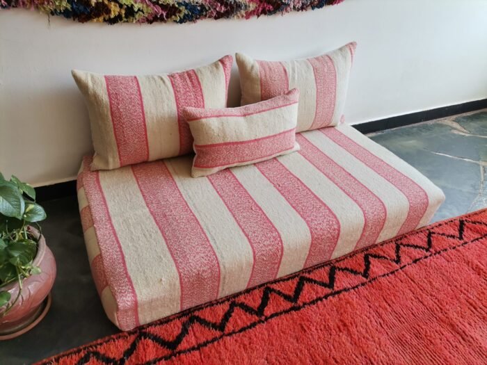 Moroccan wool couch in cream and light pink blend – handwoven low seating for modern interiors