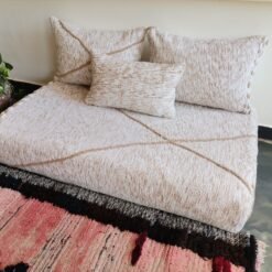 Right side of Moroccan floor couch in cream with beige embroidery – handmade low seating for textured and elegant decor
