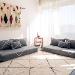 Left view of dark gray handwoven Moroccan couch – boho and contemporary floor seating with cushions