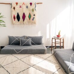 Top view of dark gray Moroccan floor couch – artisan seating set for moody, modern decor