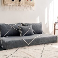 Close-up of dark gray plain cushions – handmade Moroccan covers for minimalist and moody living rooms