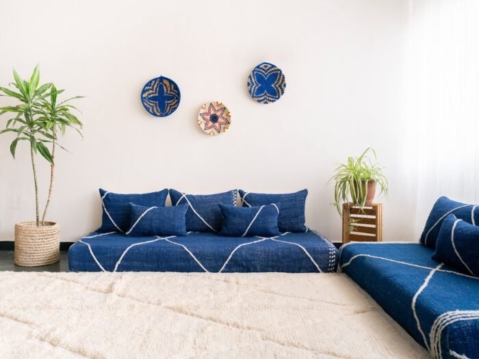 Main image of blue handmade Moroccan floor couch – artisan low seating with plain cushions for calming boho-style interiors