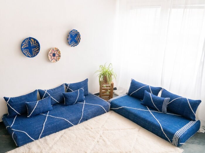 Top view of Moroccan blue floor sofa – handwoven low seating set with plain cushions for relaxed boho spaces