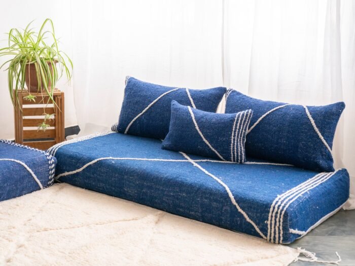 Right side view of handcrafted blue Moroccan floor sofa – boho-style low seating with cushion covers for modern interiors