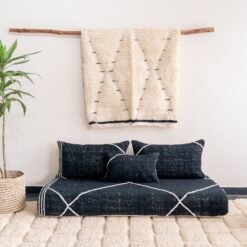 Video showing handcrafted black Moroccan couch – minimalist floor seating with plain cushions for bold, luxurious decor