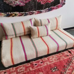 Moroccan handmade floor seating in cream with bright colored stripes – low couch for artistic home decor