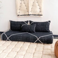 Right side view of handcrafted black Moroccan floor sofa – artisan low seating with cushion cover set for bold and elegant interiors