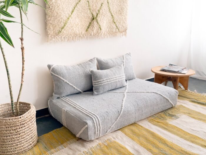 Left angle of light gray handmade Moroccan floor sofa – perfect for minimalist and Scandinavian decor styles
