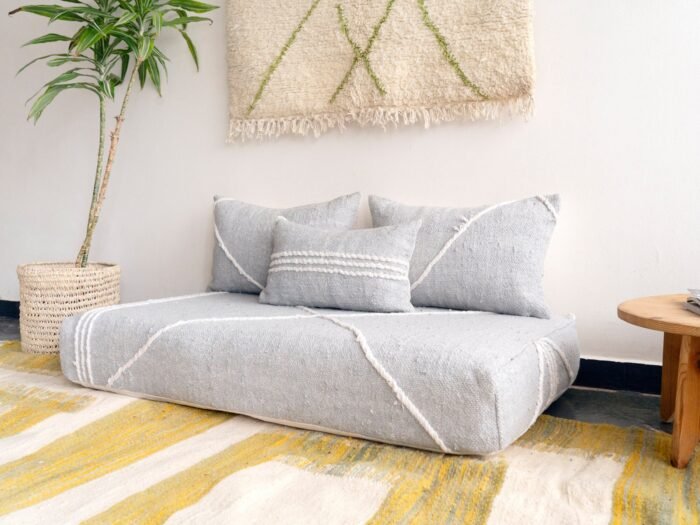 Right side view of light gray Moroccan floor couch – handcrafted sofa with cushion covers for modern and neutral interiors