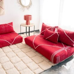 Right side of red Moroccan floor sofa – bold handmade seating perfect for bohemian and contemporary interiors