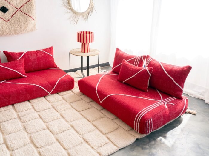 Right side of red Moroccan floor sofa – bold handmade seating perfect for bohemian and contemporary interiors