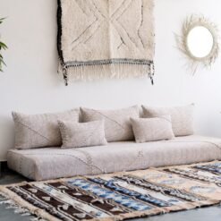 Left view of Moroccan floor seating in beige mixed with white – handmade cover set perfect for airy, cozy homes