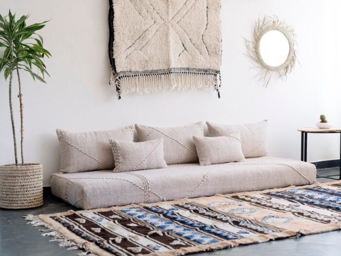 Left view of Moroccan floor seating in beige mixed with white – handmade cover set perfect for airy, cozy homes