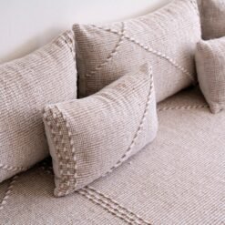 Top view of beige and white Moroccan floor sofa – handwoven seating with soft cushion covers for minimalist rooms