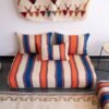 Main image of handmade Moroccan wool floor sofa in Cream with Blue and Orange Stripes – artisan low seating with cushion cover set for cozy boho living rooms