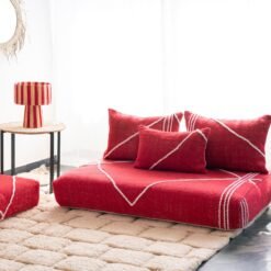 Right side of red Moroccan floor sofa – bold handmade seating perfect for bohemian and contemporary interiors