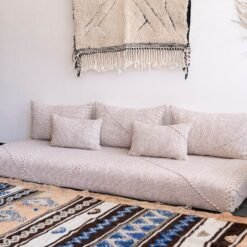 Right side of handmade Moroccan sofa in beige and white – soft, cozy floor seating for modern bohemian decor