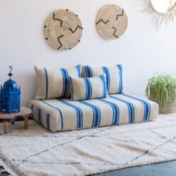 Main image of Moroccan wool floor couch in cream with blue stripes – artisan low seating for modern, airy boho homes