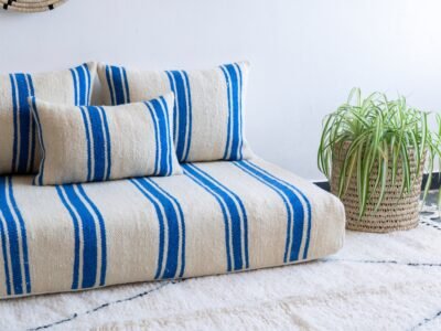 Pillows from Moroccan wool couch in cream and blue – artisan cushions for coastal bohemian décor