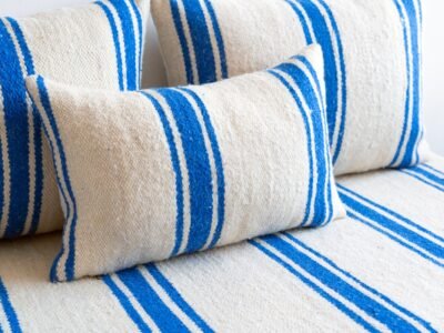 Pillows from Moroccan wool couch in cream and blue – artisan cushions for coastal bohemian décor