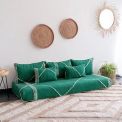 Left view of artisan green Moroccan floor sofa with plain cushions – ideal for natural and cozy living room styling