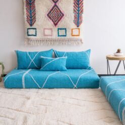 Artisan turquoise Moroccan floor sofa with matching plain cushions – perfect for coastal, boho, or modern living spaces
