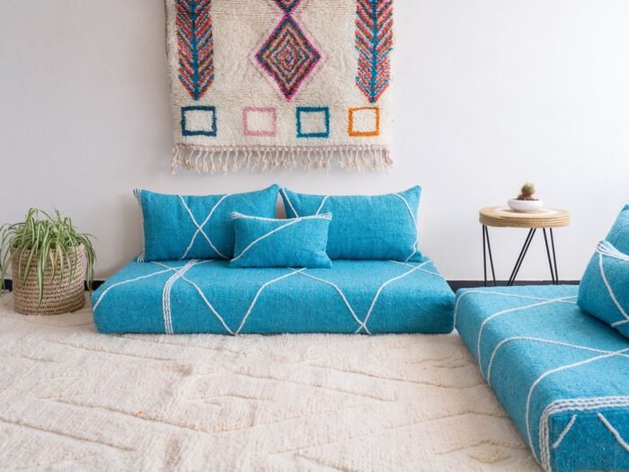 Artisan turquoise Moroccan floor sofa with matching plain cushions – perfect for coastal, boho, or modern living spaces