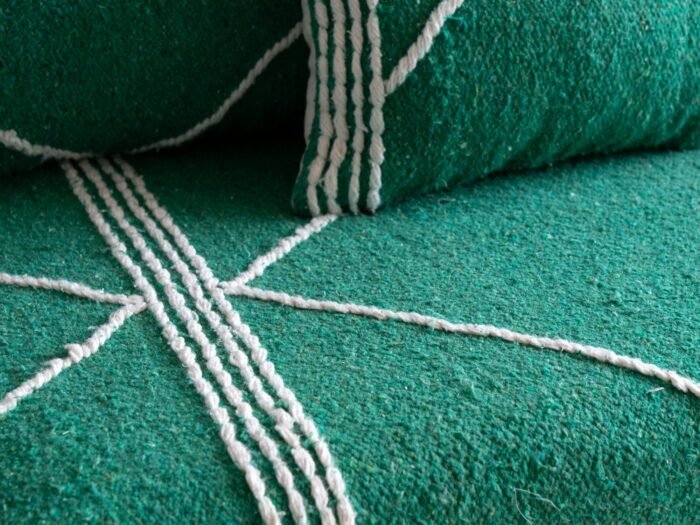 Top view of handmade green Moroccan sofa – low floor seating set with cushion covers for peaceful and earthy decor