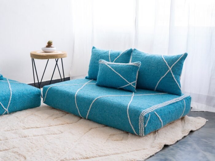 Right side view of turquoise Moroccan floor seating – handmade low sofa for relaxed coastal or boho spaces