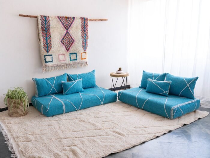 Artisan turquoise Moroccan floor sofa with matching plain cushions – perfect for coastal, boho, or modern living spaces