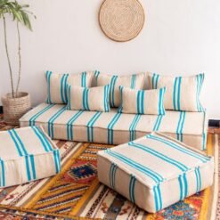 Top-down image of Moroccan cream sofa with turquoise lines – artisan low floor seating for coastal-inspired homes
