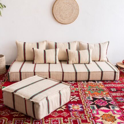 Main image of Moroccan wool floor couch in cream with red and green stripes – low handcrafted seating with cushions for festive boho vibes