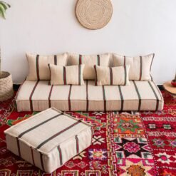 Main image of Moroccan wool floor couch in cream with red and green stripes – low handcrafted seating with cushions for festive boho vibes
