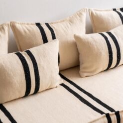 Cushions from Moroccan floor sofa with black stripes – artisan wool pillows for modern and boho interiors